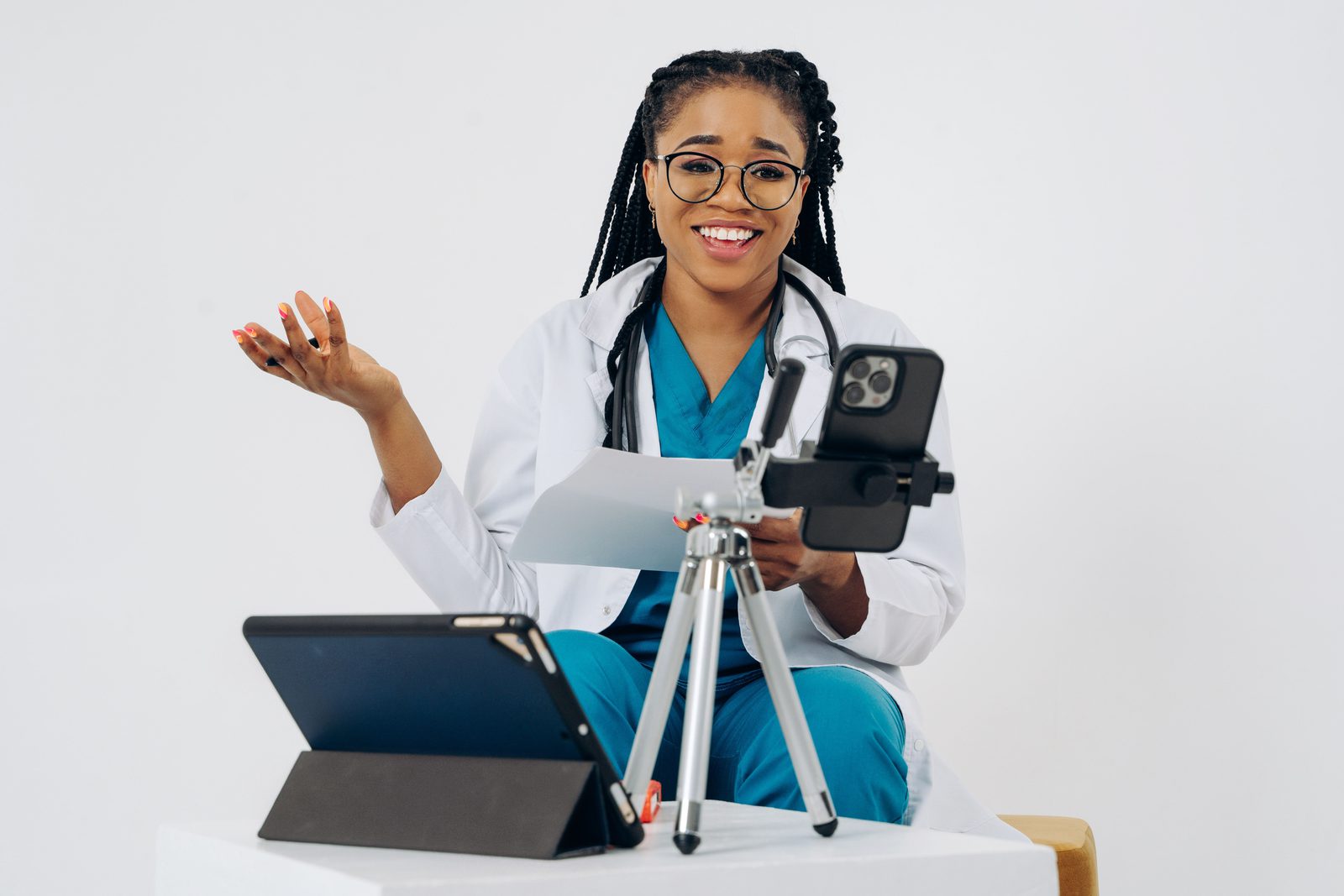 A smiling doctor ready for a video consultation